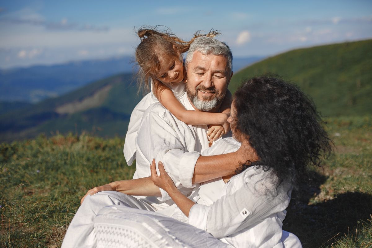 A family sharing a happy moment outdoors